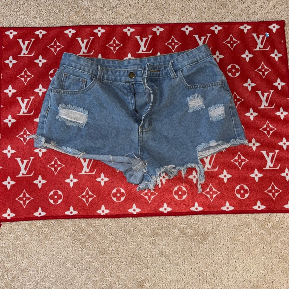 Ladies ripped Jean shorts